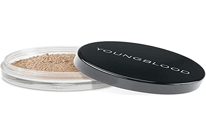 face powder in a container in front of a white background