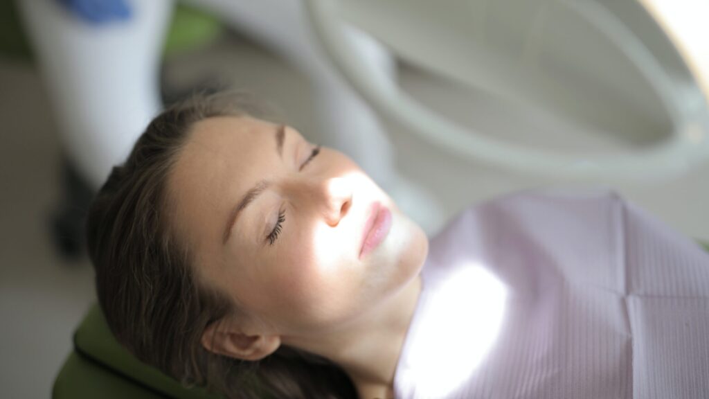 woman wearing mascara during an MRI