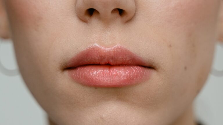 close up of a womans moisturized lips