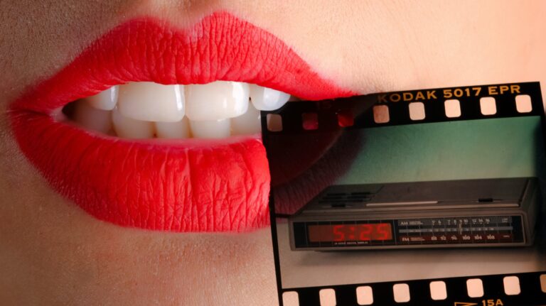 close up of lips with mauve lipstick on biting a film reel