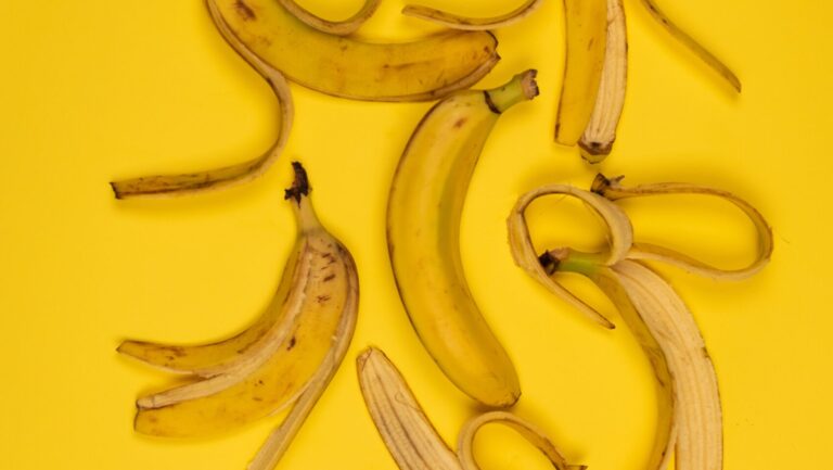 banana peel placed on a yellow surface