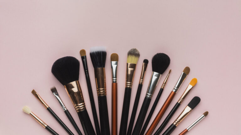 top view arrangement with makeup brushes