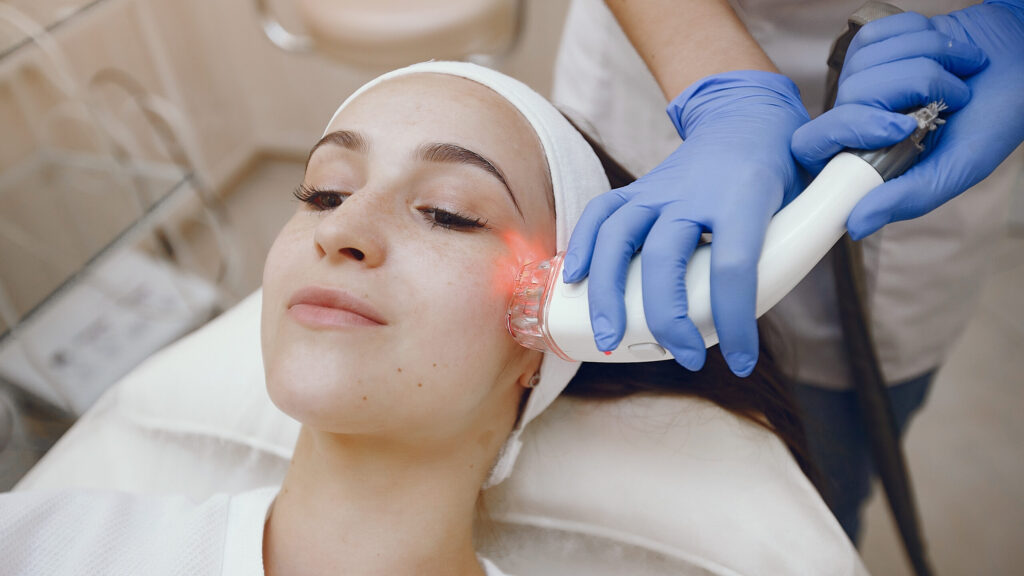 a woman getting Microdermabrasion procedure form a dermatologist